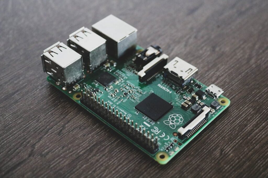 Detailed view of a Raspberry Pi circuit board with microchips and components.